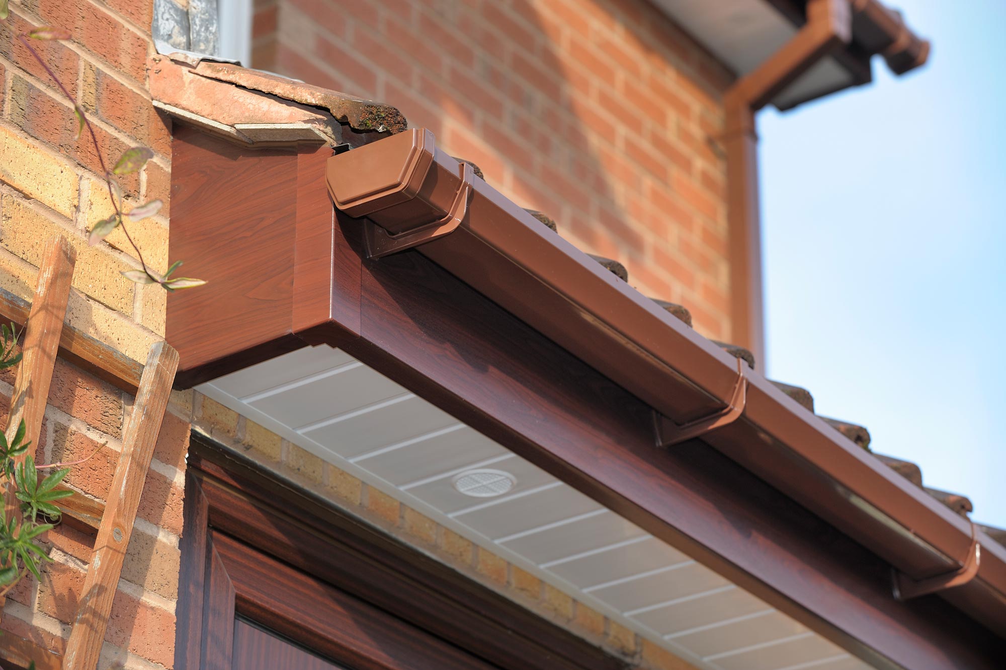 Clean fascias soffits and guttering on a UK home